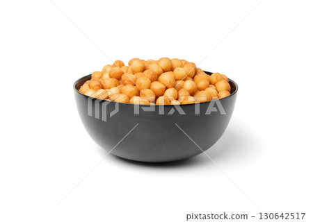 Small pastry balls, fried crispy wheat soup pearls, salad egg puffs or choux pastry Small pastry balls, fried crispy wheat soup pearls, salad egg puffs or choux pastry 130642517