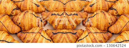 Mini croissant pattern. French puff pastries, chocolat bakery 130642524