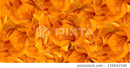 Dry sweet potato chips pattern, dried sliced red vegetable wallpaper, orange Ipomoea batatas Dry sweet potato chips pattern, dried sliced red vegetable wallpaper, orange Ipomoea batatas 130642596
