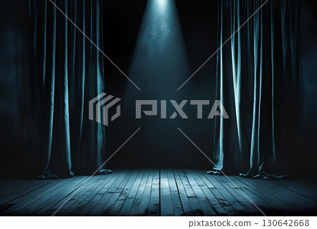 A dark stage with dirty curtains and an empty floor 130642668