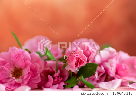 Romantic composition with roses on retro background 130643113
