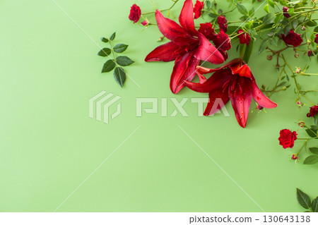 Floral botanical drawing of red lilies with red roses on green background Floral botanical drawing of red lilies with red roses on green background 130643138