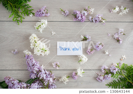 Flower frame of white and purple lilac with gratitude 130643144