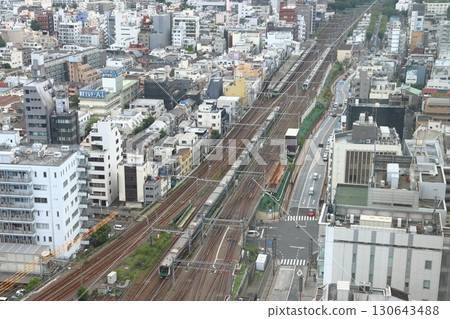 Seibu Shinjuku Line 30000 series train running parallel to the Yamanote Line and Saikyo Line Seibu Shinjuku Line 30000 series train running parallel to the Yamanote Line and Saikyo Line 130643488