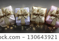 Elegant gift boxes in gold, pink, and blue with stylish bows and sparkling lights, festive luxury holiday presents, celebration, party, and modern packaging concept 130643921