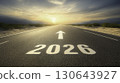 Road to 2026 written on highway with white arrow pointing toward the sunrise, motivational future journey, success, career goals, and new year resolution concept 130643927