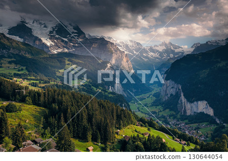 Majestic view of alpine village. Location Swiss alps, Lauterbrunnen valley, Wengen, Europe. 130644054