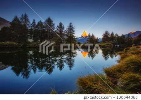 Great panorama with famous peak Matterhorn. Location place Swiss alps, Grindjisee, Europe. Beauty world. Great panorama with famous peak Matterhorn. Location place Swiss alps, Grindjisee, Europe. Beauty world. 130644063