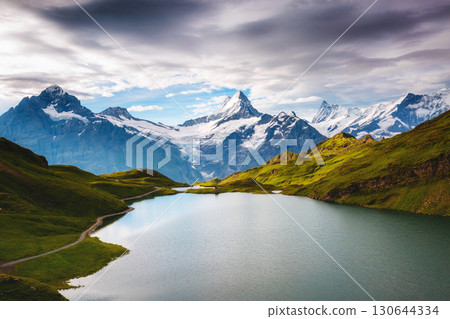 Panorama of Mt. Schreckhorn and Wetterhorn. Location place Bachalpsee in Swiss alps, Grindelwald, Europe. 130644334
