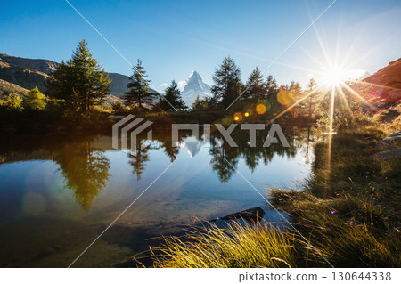 Great panorama with famous peak Matterhorn. Location place Swiss alps, Grindjisee, Europe. Beauty world. Great panorama with famous peak Matterhorn. Location place Swiss alps, Grindjisee, Europe. Beauty world. 130644338