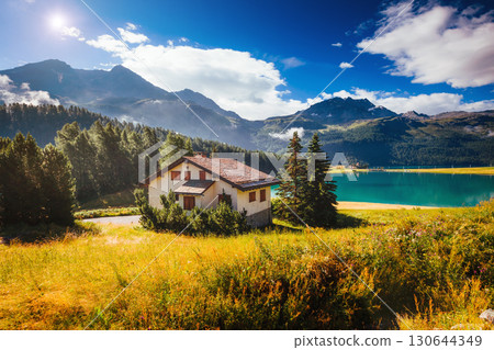 Great view of the azure pond Champfer. Location Swiss alps, Silvaplana village, district of Maloja, Europe. 130644349