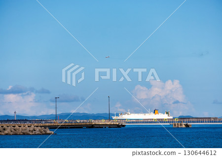 A large tanker sailing offshore. Naha Tomari Port, Naha City, Okinawa Prefecture - June 26, 2025 130644612