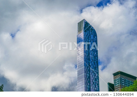 Curved glass building 130644894