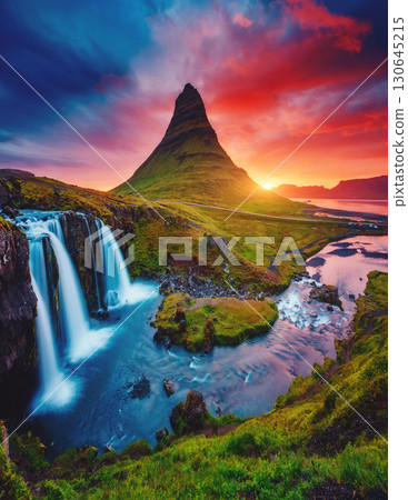Kirkjufell volcano the coast of Snaefellsnes peninsula. Location famous Kirkjufellsfoss waterfall, Iceland, Europe. 130645215