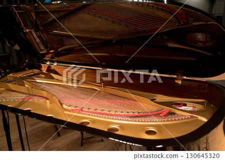 A grand piano set up on the stage 130645320