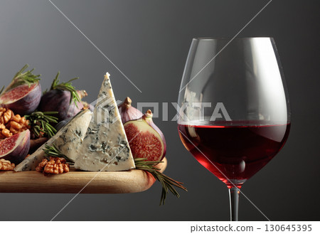 Red wine with blue cheese, figs, walnuts, and rosemary. Red wine with blue cheese, figs, walnuts, and rosemary. 130645395