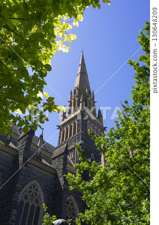 Melbourne, Australia - December 29,2023 : Historical St. Patrick's Cathedral with blue sky in Melbourne, Australia on December 29,2023. Melbourne, Australia - December 29,2023 : Historical St. Patrick's Cathedral with blue sky in Melbourne, Australia on December 29,2023. 130648209