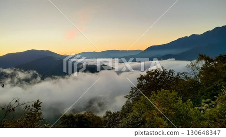 The fantastical sea of clouds and the magnificent view of Uonuma's "Takigumo" waterfall 130648347