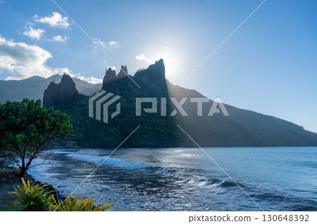 Sunset over Hatiheu Bay and beach in Nuku Hiva, French Polynesia 130648392