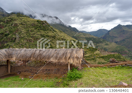 Ancient Inca ruins of Pisac nestled in the Andean mountains, Peru 130648401