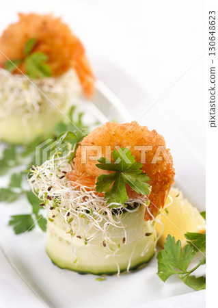 Cucumber and shrimp appetizer 130648623