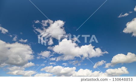 A Beautiful and Cloudy Sky Spreads Out Overhead, Creating a Stunning and Dynamic View A Beautiful and Cloudy Sky Spreads Out Overhead, Creating a Stunning and Dynamic View 130648853