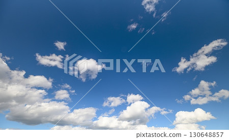 The Beautiful Blue Sky adorned with Fluffy Clouds during the Daylight hours is truly captivating The Beautiful Blue Sky adorned with Fluffy Clouds during the Daylight hours is truly captivating 130648857