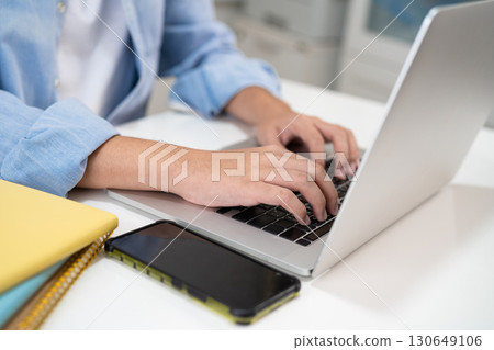 Teenage use laptop and mobile phone search data online to online learning university education. Teenage use laptop and mobile phone search data online to online learning university education. 130649106