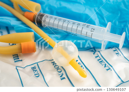 Foley urinary catheter with urine bag for disability or patient in hospital. 130649107