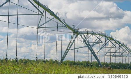 The Innovative Modern Agricultural Irrigation System Presents Under a Beautiful Blue Sky The Innovative Modern Agricultural Irrigation System Presents Under a Beautiful Blue Sky 130649350