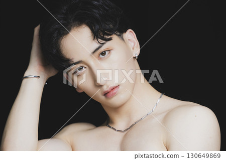 Male portrait on black background 130649869