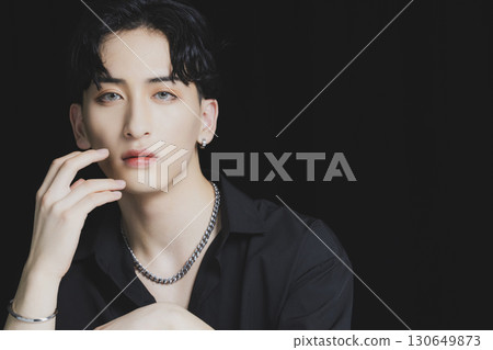 Male portrait on black background 130649873