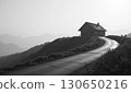 Mountain road and hut on the hill 130650216