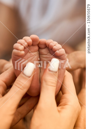 Newborn Baby Feet in Parent's Hands Newborn Baby Feet in Parent's Hands 130650879