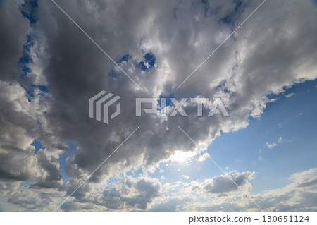 A Dramatic Cloudscape with Sunlight, creating an artistic atmosphere filled with beauty 130651124