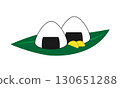 Rice balls and pickles on bamboo leaves 130651288