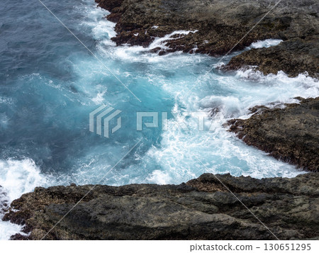 Ocean and waves crashing on rocks Ocean and waves crashing on rocks 130651295