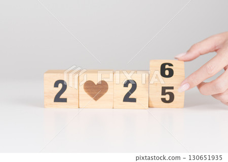 2025 end year to Happy New Year 2026 with heart block for health care, love, organ donation, resolution, charity, happy family, wellbeing and insurance concepts 130651935
