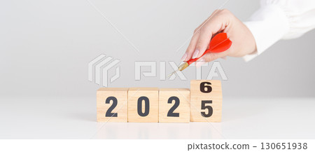 red dart with  chess people and 2026 year blocks.. Goal, plan, action, target, strategy, leadership, New Year and marketing concept 130651938