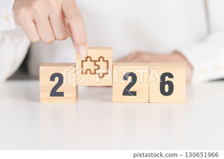 2026 year block with jigsaw puzzle icon. Business Process, Team, teamwork, Goal, mission, Resolution, strategy, plan, Action, partnership, and New Year start 130651966