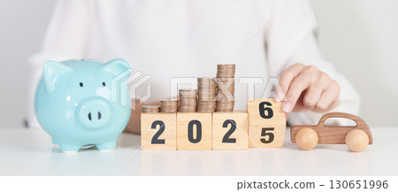2025 end year to Happy New Year 2026 with car model and Coins Money stack for deposit and Automobile Tax. Money Saving, Car Insurance, Financial, vehicle Repair and Maintenance and New Year concept 130651996