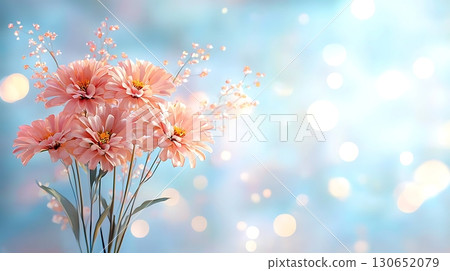 Beautiful Pink Flowers with Delicate Blooms Against a Soft Blue Background 130652079