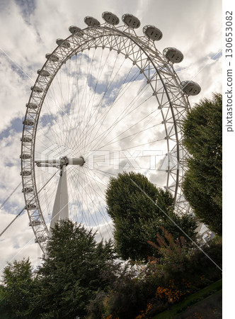 The prominently features the London Eye also known as the Millennium Wheel, is a prominent iconic cantilevered observation wheel. The prominently features the London Eye also known as the Millennium Wheel, is a prominent iconic cantilevered observation wheel. 130653082
