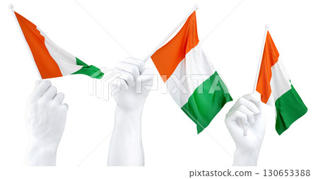 Hands waving flag of Ivory Coast isolated on white. 3d Rendering Hands waving flag of Ivory Coast isolated on white. 3d Rendering 130653388