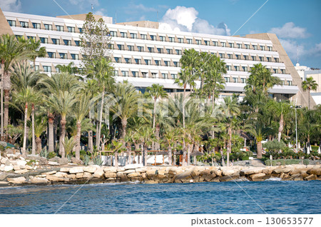 Beach hotel standing on the coast of Cyprus on a sunny day. Limassol 130653577