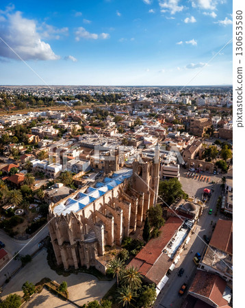 Ancient gothic cathedral of Saint Nicholas standing among Famagusta city buildings. Cyprus Ancient gothic cathedral of Saint Nicholas standing among Famagusta city buildings. Cyprus 130653580