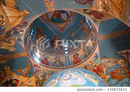 Colorful frescoes depicting religious scenes decorating the ceiling of a Agios Nikolaos Church in Paralimni, Cyprus 130653631