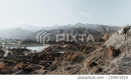 Water reservoir surviving a devastating forest fire near Arakapas village. Limassol District, Cyprus Water reservoir surviving a devastating forest fire near Arakapas village. Limassol District, Cyprus 130653824