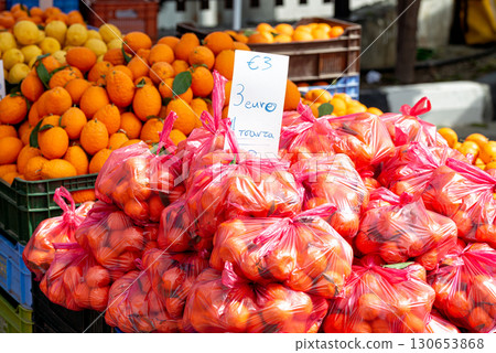 Fresh tangerines and oranges waiting for customers at the farmers market Fresh tangerines and oranges waiting for customers at the farmers market 130653868