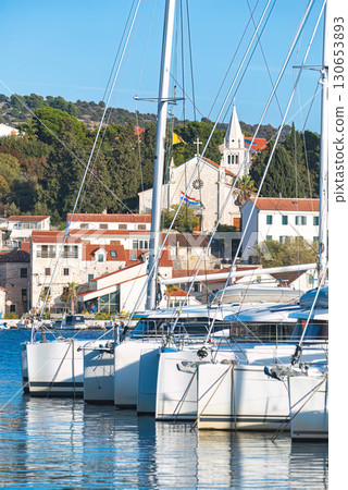 Sailboats docked in picturesque Rogoznica, Croatia, on sunny day Sailboats docked in picturesque Rogoznica, Croatia, on sunny day 130653893